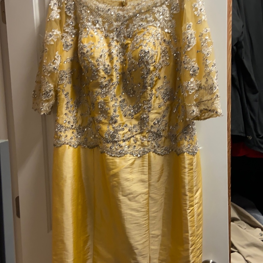 Gown new never worn, size 18 asking $100. 00 .